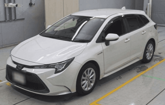 Toyota Corolla Touring Hybrid 2020 — shipped to UK